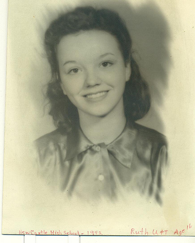 Faded black and white photo of my mom, with handwritten note in the bottom margin: New Castle High School 1942, Ruth Thompson - Age 16